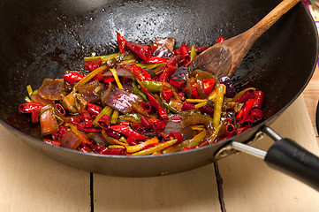 Image showing fried chili pepper and vegetable on a wok pan