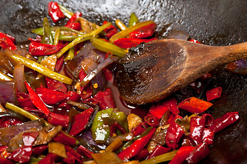 Image showing fried chili pepper and vegetable on a wok pan