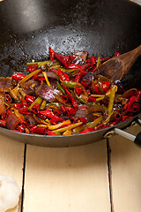 Image showing fried chili pepper and vegetable on a wok pan