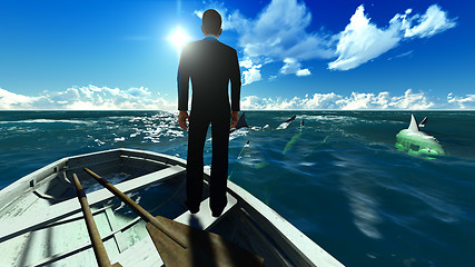 Image showing businessman surrounded by sharks 