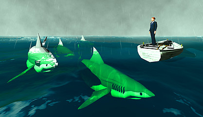 Image showing businessman surrounded by sharks 