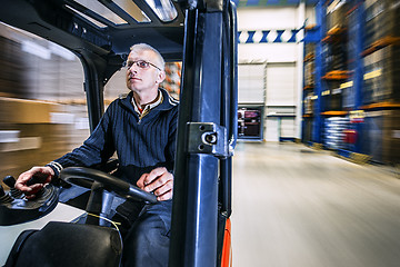 Image showing working in a warehouse