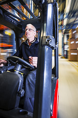 Image showing driving a forklift