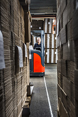 Image showing middle aged reach truck driver