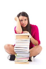 Image showing Portrait of a girl teenager with her books on white 