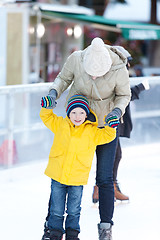 Image showing family ice skating