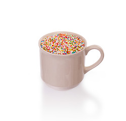 Image showing Candy decorations in a white cup