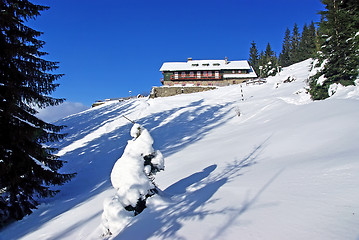 Image showing Winter at mountain chalet