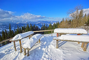 Image showing Snow on table and seats