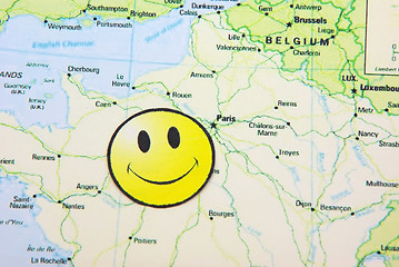 Image showing Smile face on a map