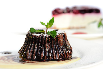 Image showing Chocolate fondant with peppermint leaves