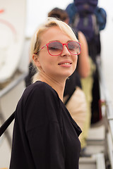 Image showing Woman boarding airplane.