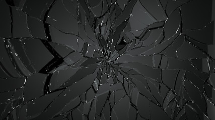 Image showing Destructed and broken glass on black