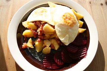 Image showing Dish with bacon,egg,potato and beetroot