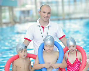 Image showing children group  at swimming pool