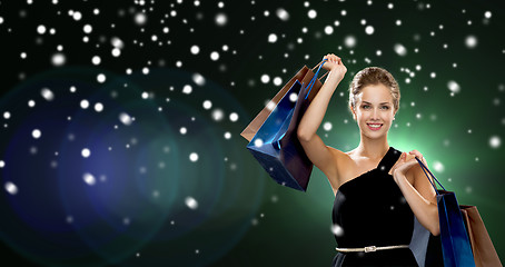 Image showing smiling woman with shopping bags