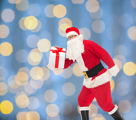 Image showing man in costume of santa claus with gift box