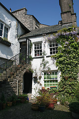 Image showing cottage covered in ivy