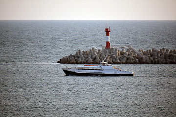 Image showing A ship and the lighthouse