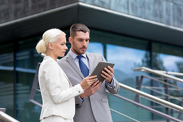 Image showing businesspeople with tablet pc outdoors