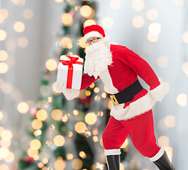 Image showing man in costume of santa claus with gift box