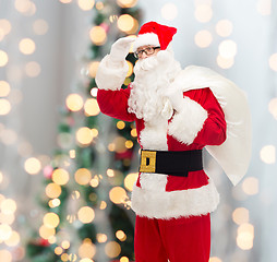 Image showing man in costume of santa claus with bag