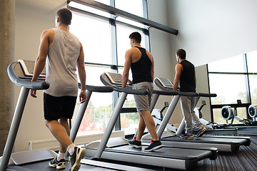 Image showing men exercising on treadmill in gym