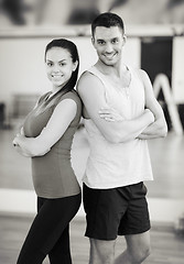 Image showing two smiling people in the gym