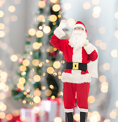 Image showing man in costume of santa claus with bag