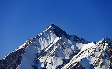 Image showing Snowy rocks in evening