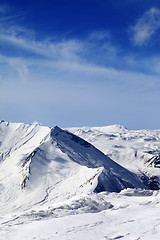 Image showing Snowy mountains at sunny day