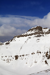 Image showing Snowy rocks in nice sun day