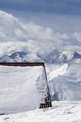 Image showing Roof of hotel in snow and ski slope