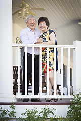 Image showing Attractive Chinese Couple Enjoying Their House