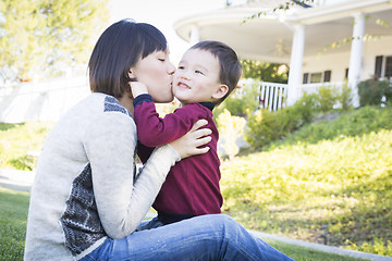 Image showing Chinese Mother Having Fun with Her Mixed Race Baby Son