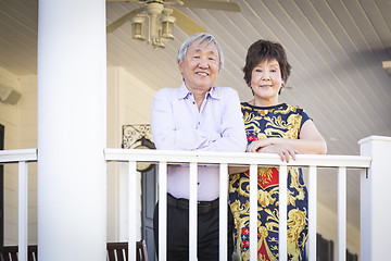 Image showing Attractive Chinese Couple Enjoying Their House