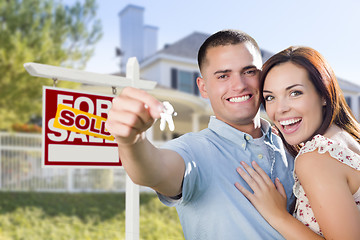 Image showing Military Couple In Front of Home, House Keys and Sign