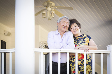 Image showing Attractive Chinese Couple Enjoying Their House