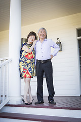 Image showing Attractive Chinese Couple Enjoying Their House