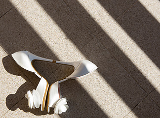 Image showing white wedding shoes. Close up