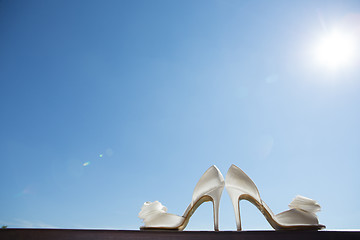 Image showing white wedding shoes. Close up