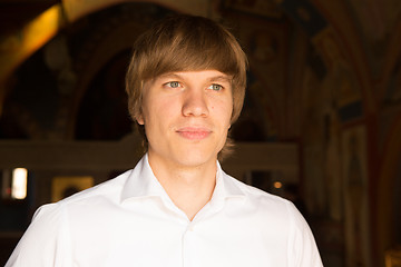 Image showing Elegant young handsome groom. Fashion portrait.