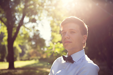 Image showing Elegant young handsome groom. Fashion portrait.