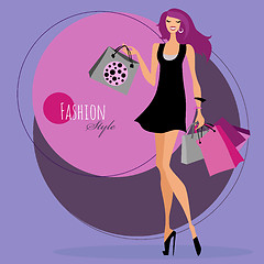 Image showing Fashion girl. Woman with shopping bags.