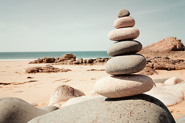 Image showing Balanced stones on the beach