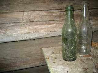 Image showing Old dusty bottles