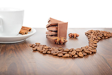 Image showing Mug, coffee beans, chocolate and anise