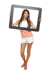 Image showing Woman looking through frame