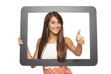 Image showing Woman looking through frame