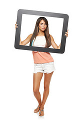 Image showing Woman looking through frame